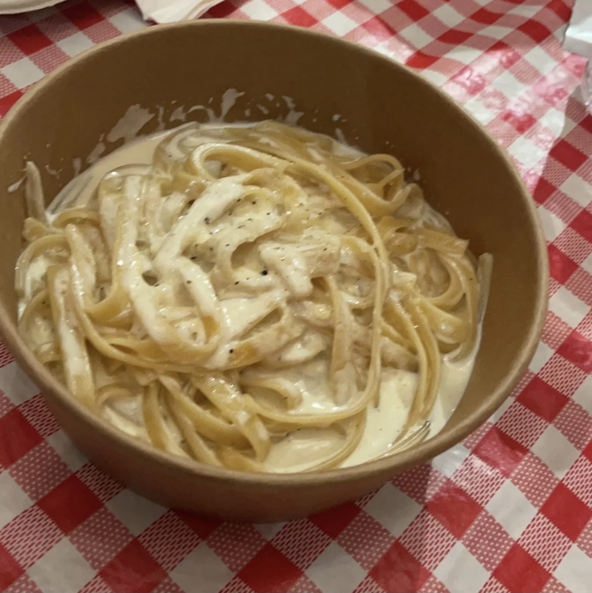 Fettuccine Alfredo in a cream sauce with basil