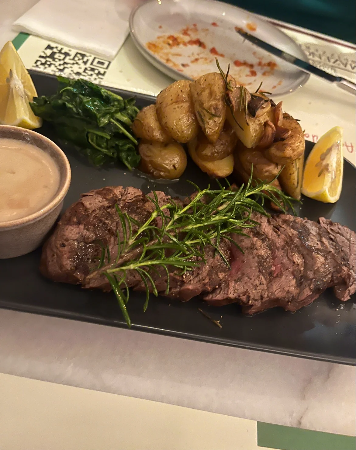 A shared steak platter for the table